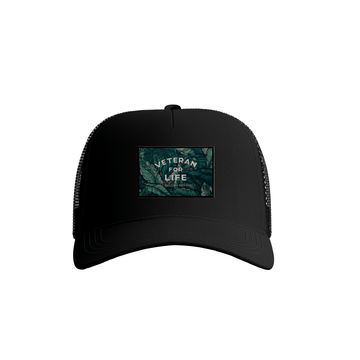 A black trucker hat with a leaf patch on the front featuring text.