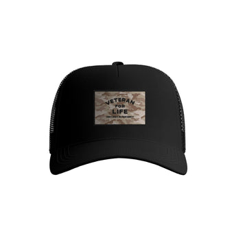 A black trucker hat with a desert camouflage patch on the front featuring the text 'VETERAN FOR LIFE'.